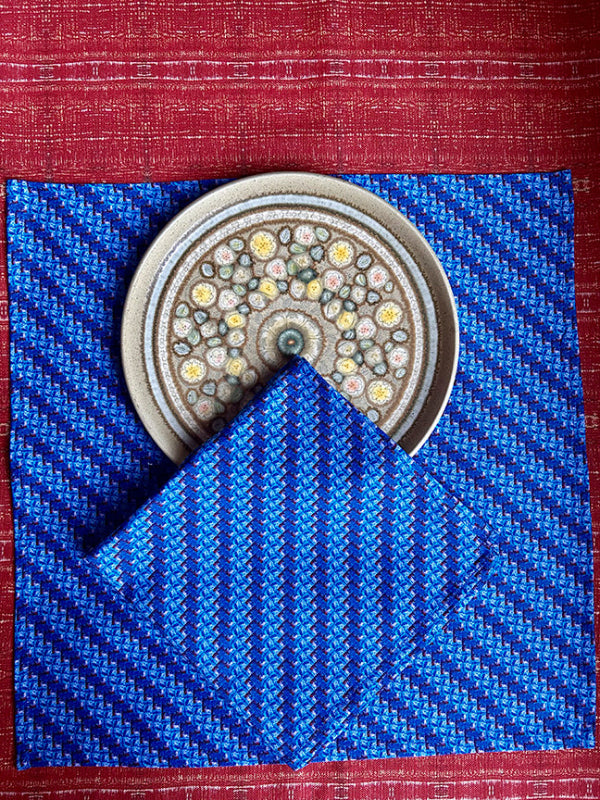 Red Key Cotton Napkins, artist-designed and handmade in the UK with vibrant blue tones. Premium, sustainable, and timeless dining accessories.