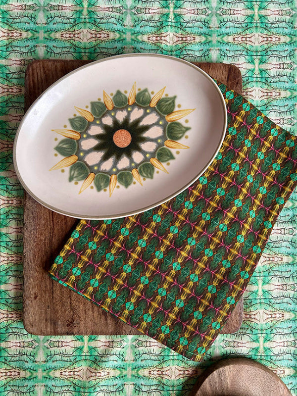 Resting Nature Tea Towel in vibrant green, artist-designed and crafted from 100% organic cotton. Sustainable, premium, and timeless kitchen accessory.