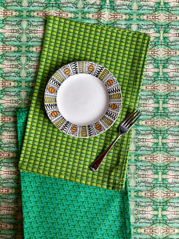 Key Lime Tea Towel in green and yellow, artist-designed with vibrant colours, crafted from 100% organically sourced cotton for sustainable luxury.