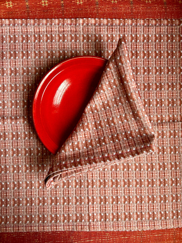 Peaches and Cream Cotton Napkins in peach and white, artist-designed and sustainably crafted from premium 100% cotton, adding elegance to your dining table.