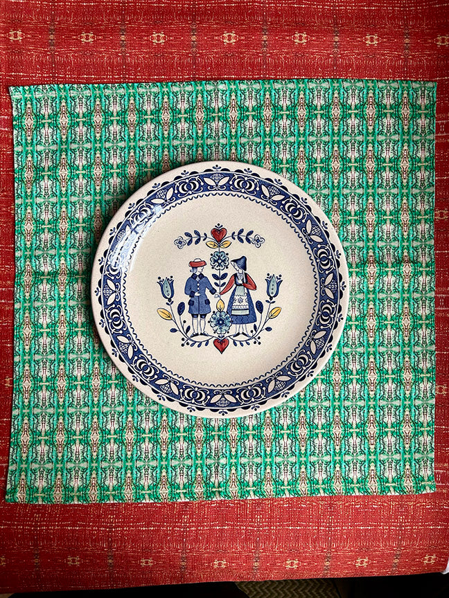 Artist-designed Green Blossoms Napkins, digitally printed on eco-friendly cotton. Elegant and sustainable for a stylish table setting.
