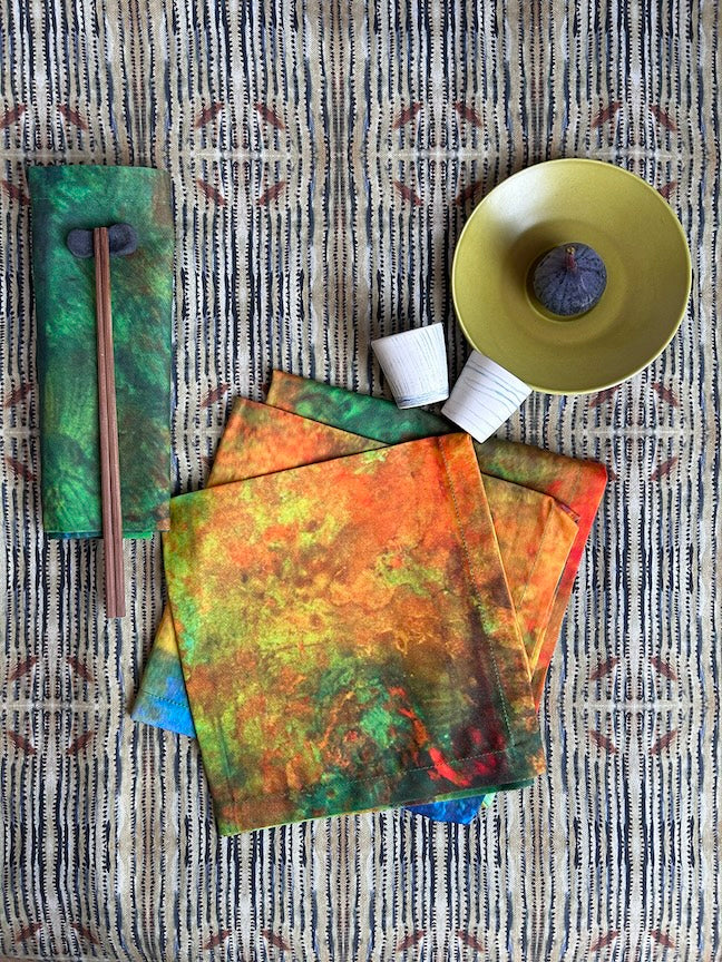 Artist-designed Happy Seasons Napkins, crafted with meticulous detail, showcasing vivid colours on soft, durable cotton fabric for a premium table setting.