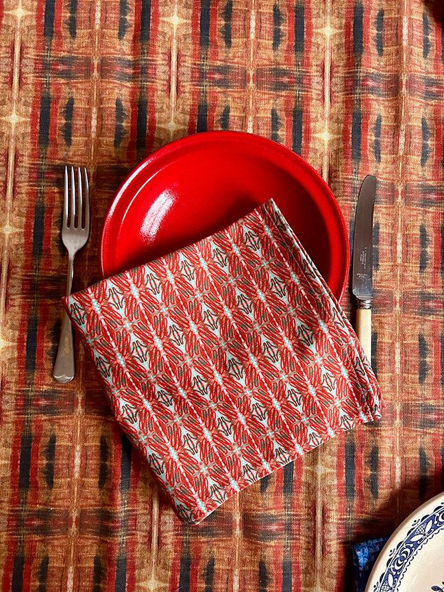 Premium artist-designed Connections cotton napkins in red and blue, digitally printed on soft, 100% cotton fabric. Eco-friendly packaging and perfect for dining occasions.