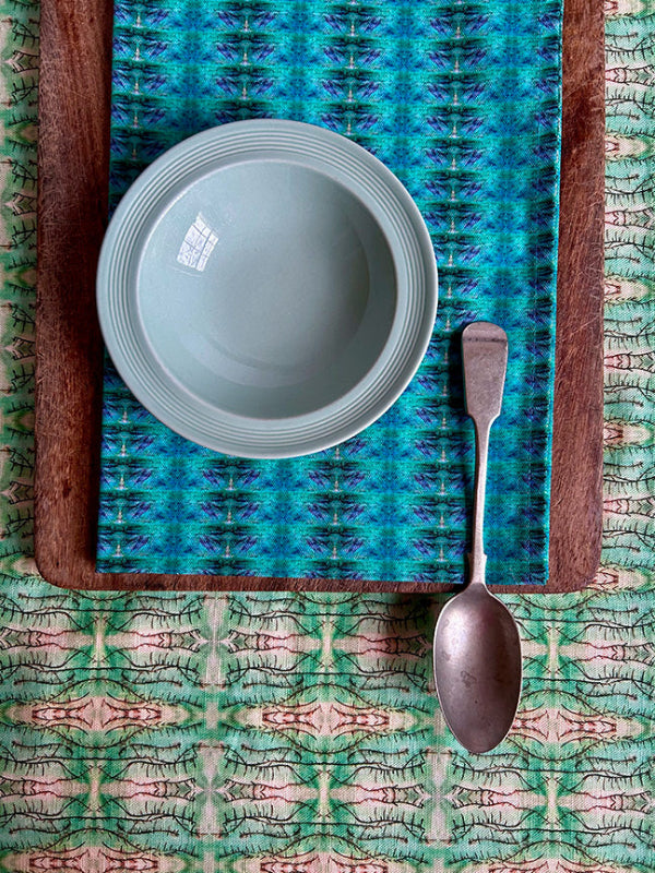 Sea and Sky Tea Towel in turquoise, a curated and sustainable design crafted from premium organic cotton. Timeless, vibrant, and of exceptional quality.