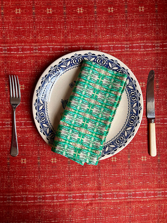 Green Blossoms Cotton Napkins, artist-designed with vibrant green and white hues. Sustainable and timeless dining accessories handmade in the UK.