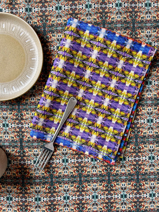 Premium and sustainable Colourful Interactions Tea Towel in multi-coloured blue, artist-designed and digitally printed on 100% organically sourced cotton, featuring vibrant colours and eco-friendly packaging.