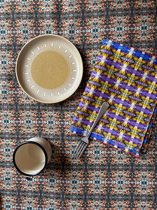 Premium and sustainable Colourful Interactions Tea Towel in multi-coloured blue, artist-designed and digitally printed on 100% organically sourced cotton, featuring vibrant colours and eco-friendly packaging.