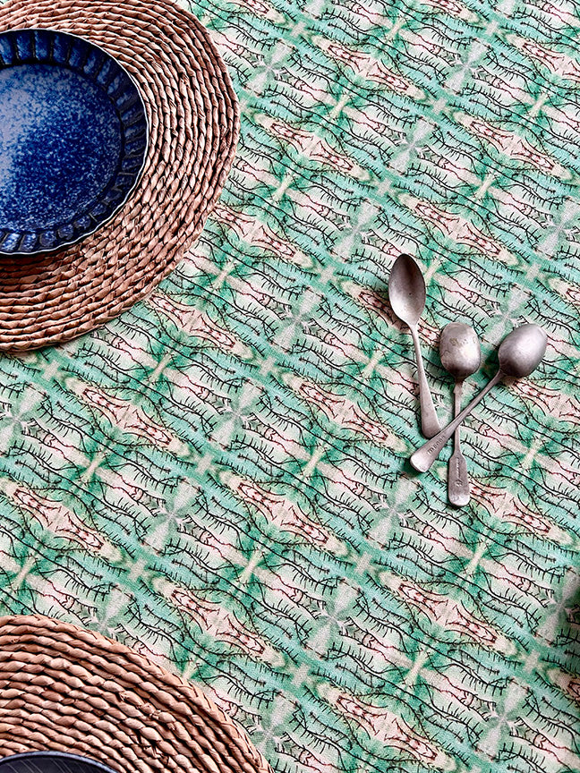 Premium Green Blossoms Cotton & Linen Tablecloth in green and white, artist-designed and sustainably crafted. Timeless, curated, and of exceptional quality.