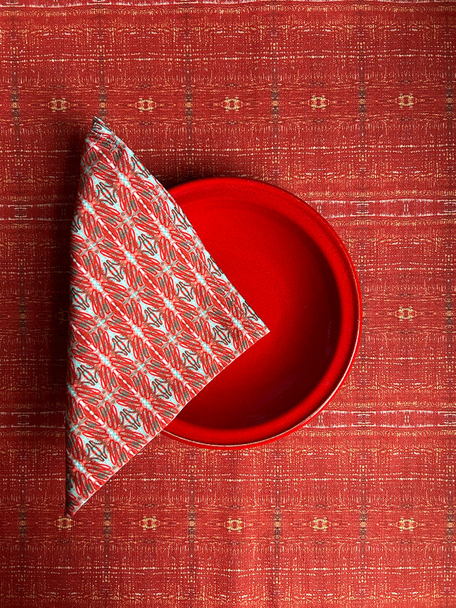 Premium artist-designed Connections cotton napkins in red and blue, digitally printed on soft, 100% cotton fabric. Eco-friendly packaging and perfect for dining occasions.